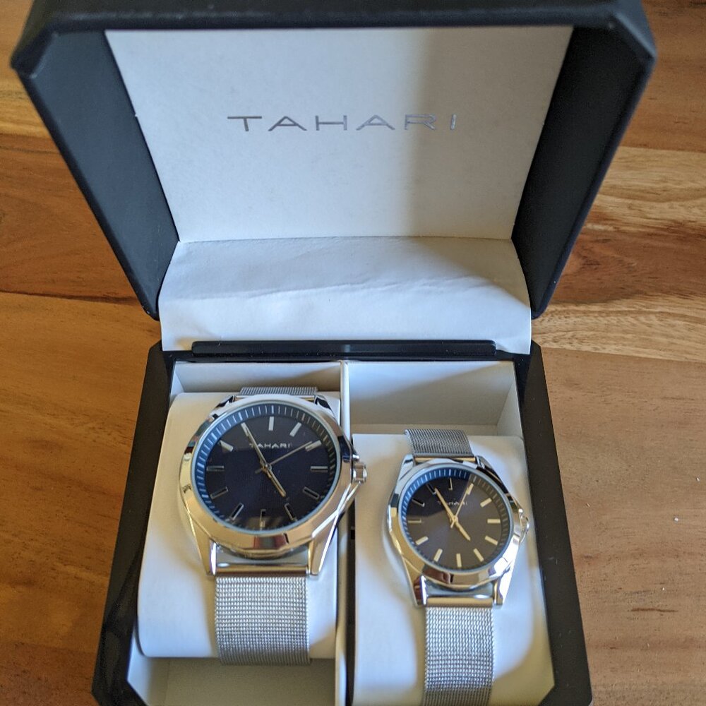 TAHARI his and her matching watches